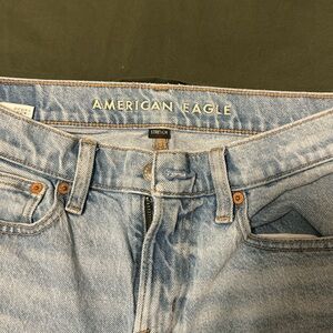 America Eagle, faded jeans ripped him, blown out knee, ripped pocket, sexy!